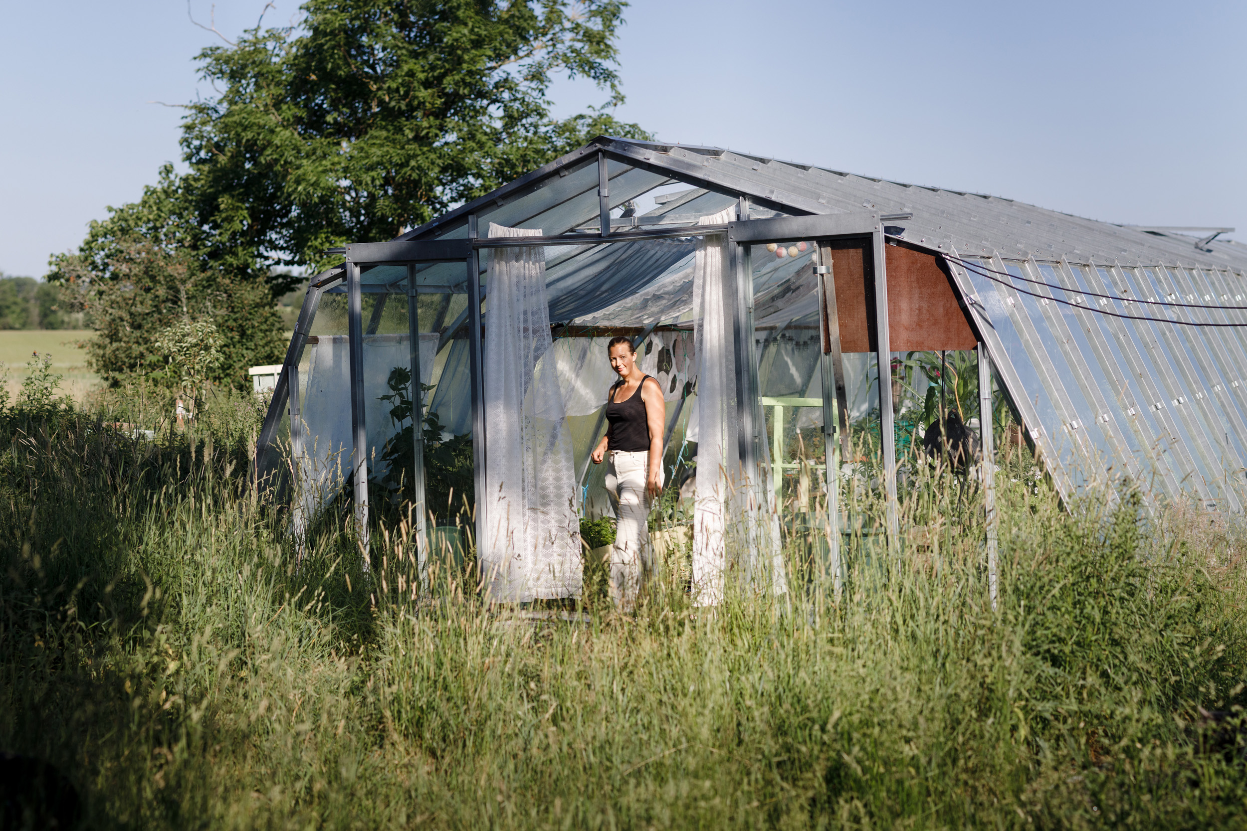 kvinna iväxthus