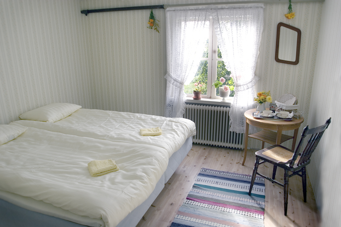 Two beds in a room at a youth hostel
