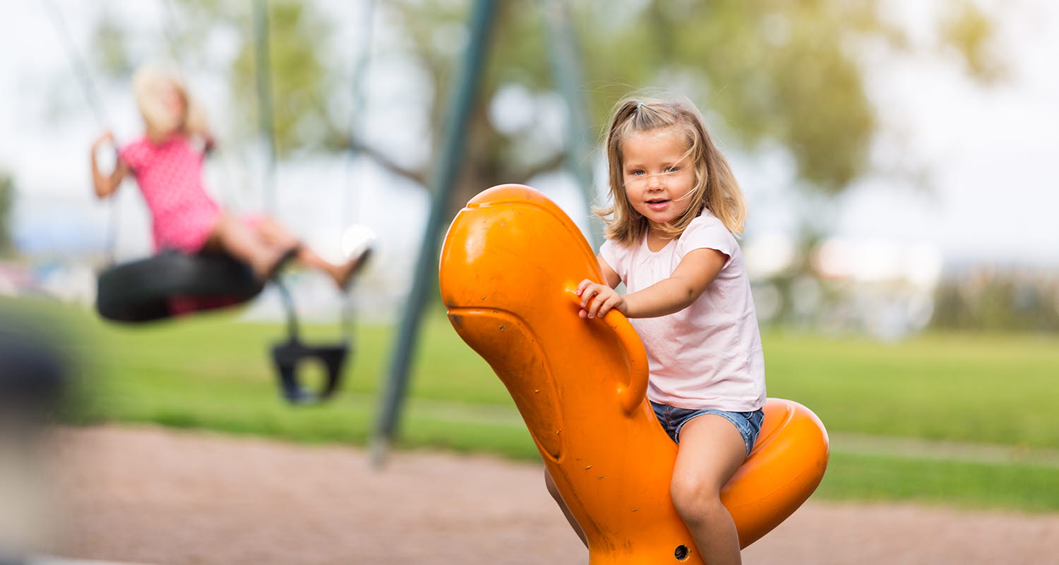 Children playing at playground in Mariestad.