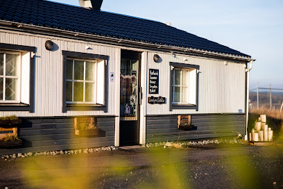 En bild på utsidan av en butik.