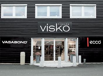 En bild på entrén till en skoaffär.