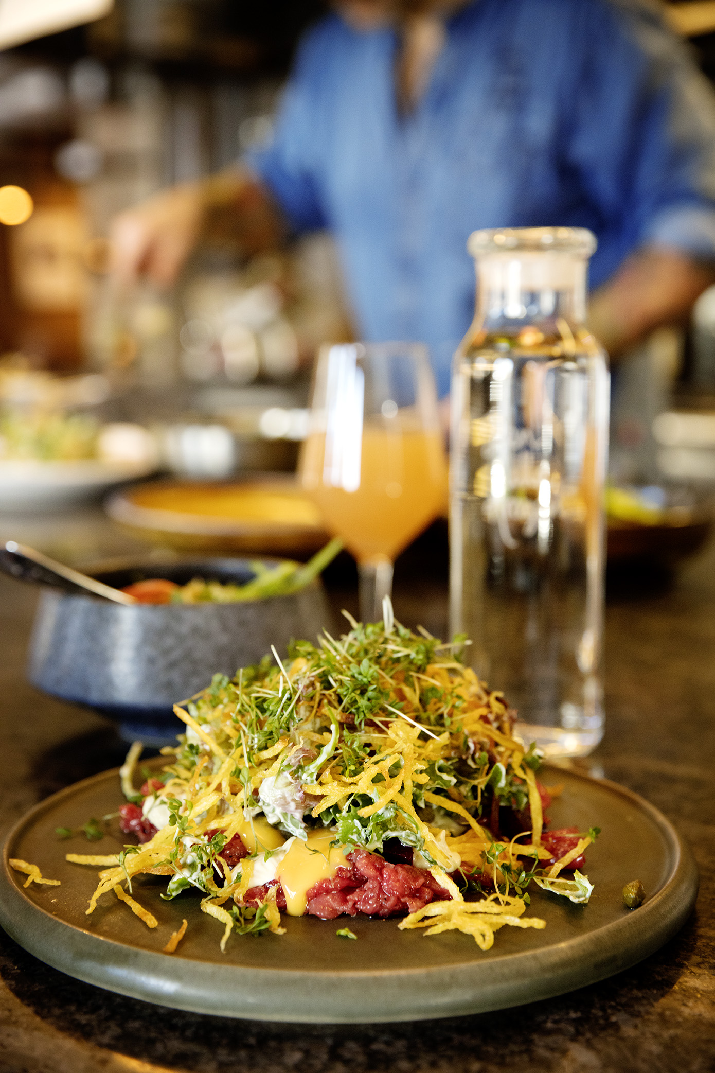 A plate with raw beef. 