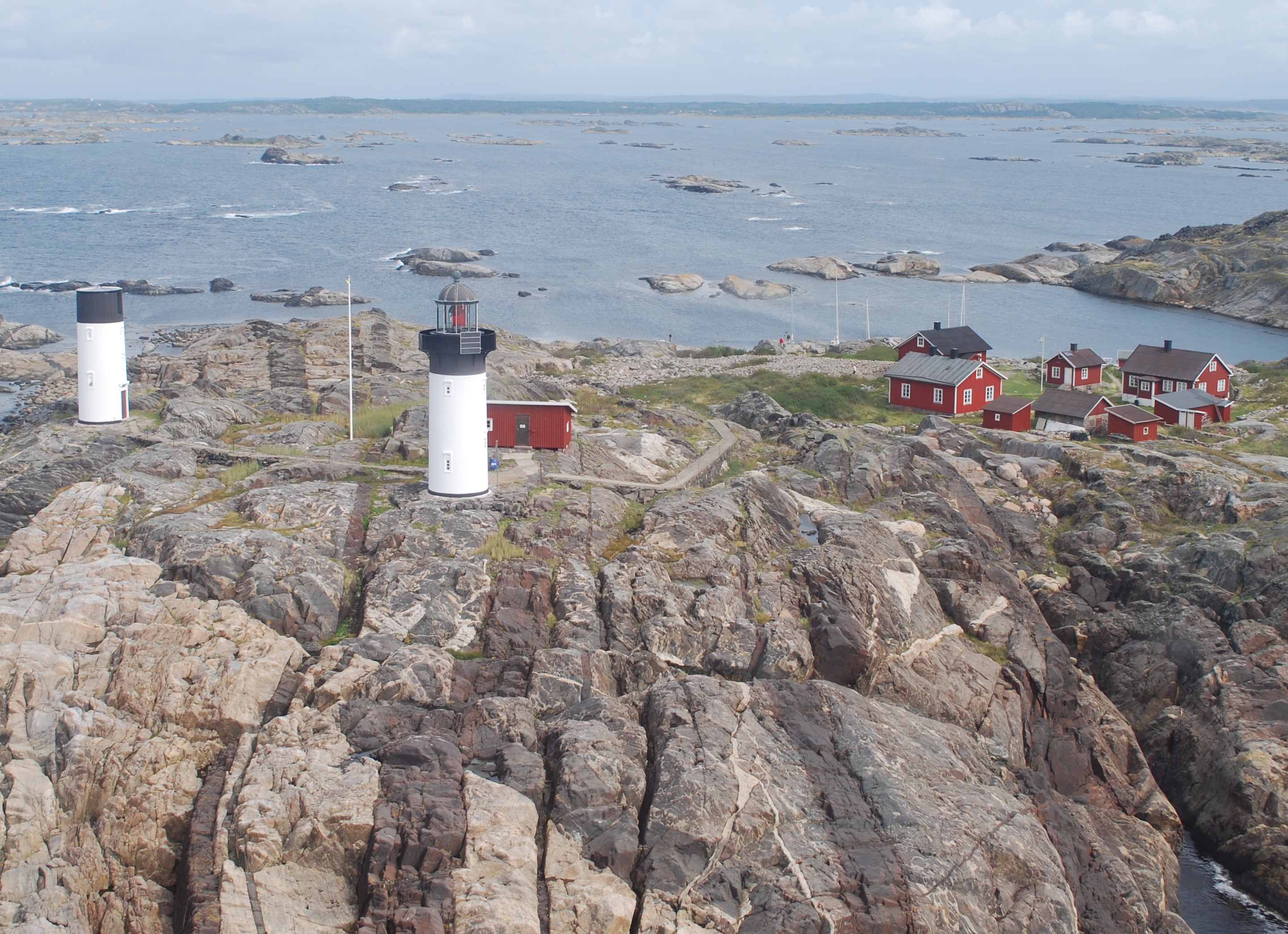 Aerial photo of the island Ursholmen with two lighthouses.