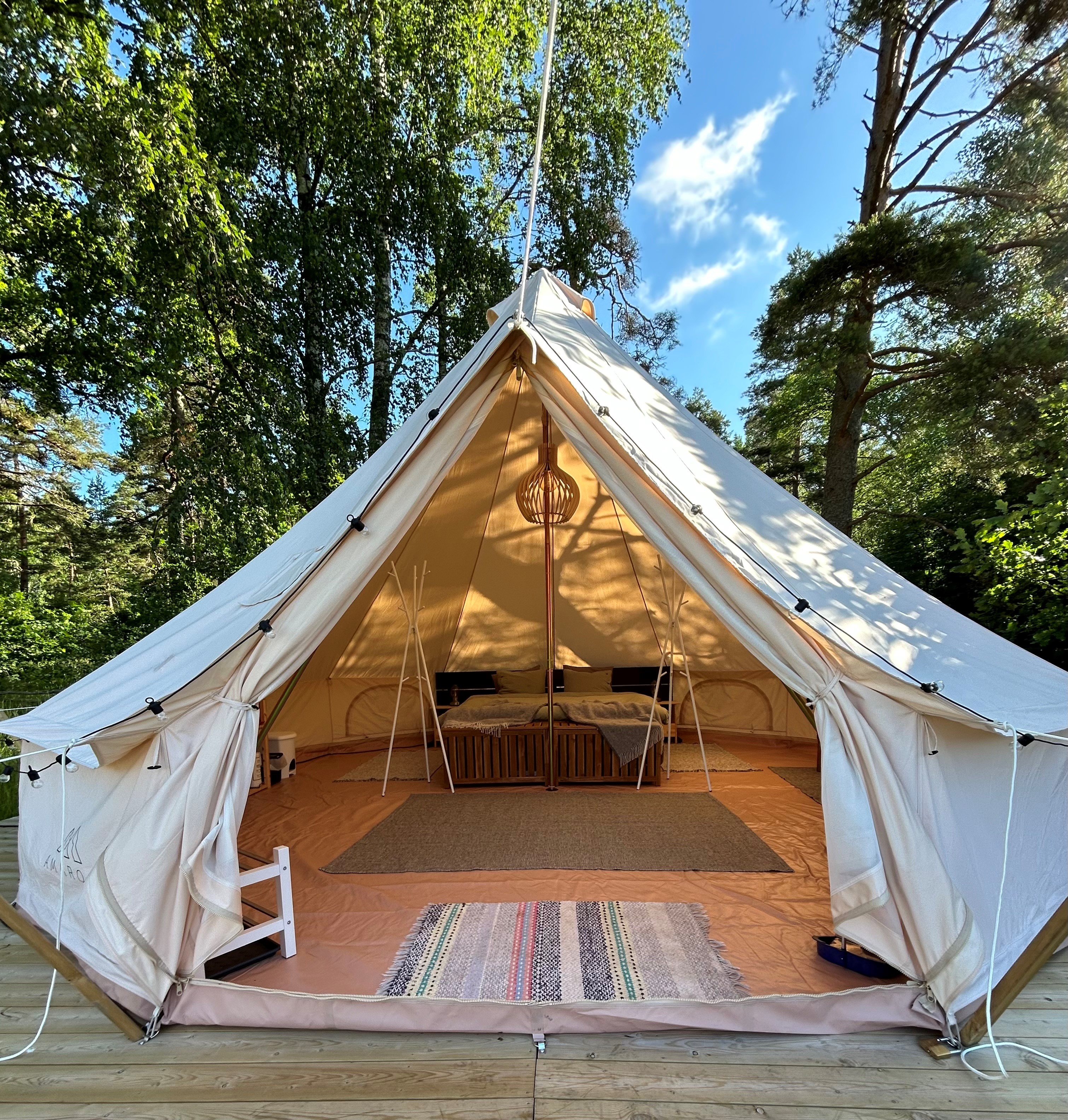 Open glamping tent with furnitures at Hunneberg