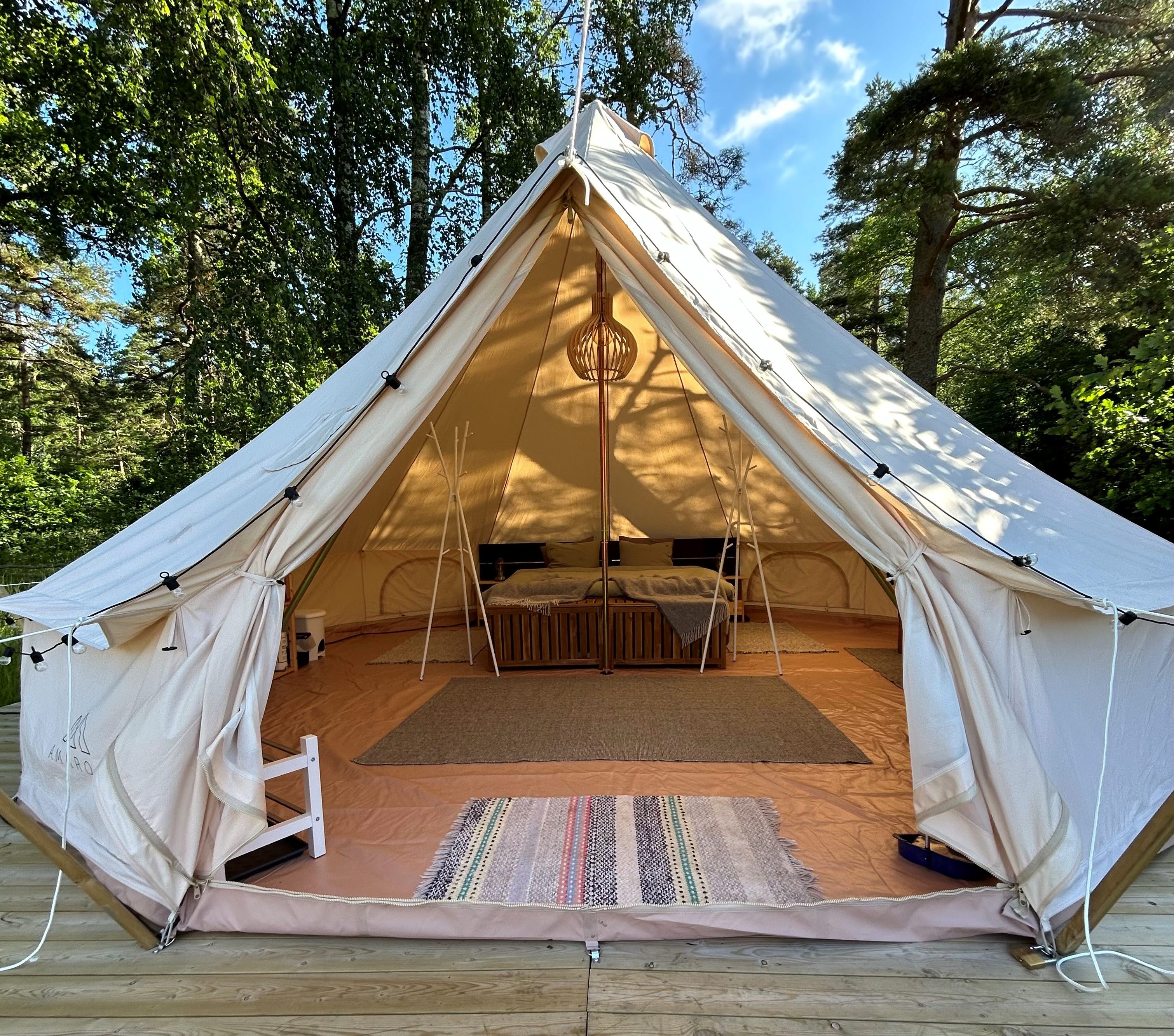 Open glamping tent with furnitures at Hunneberg