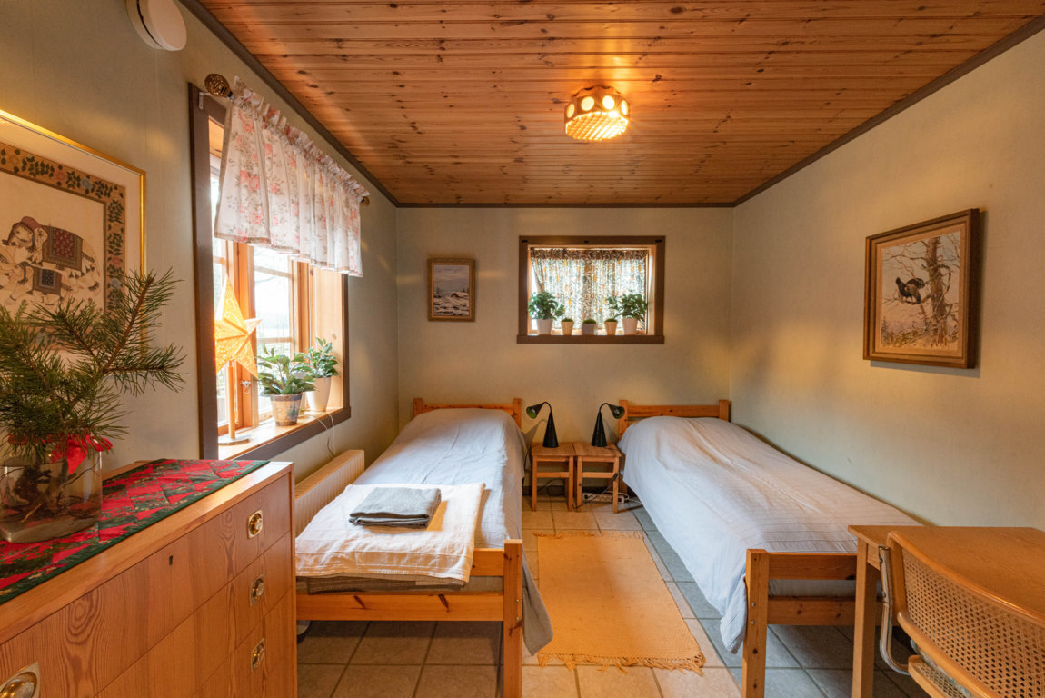 two twin beds in cozy room 