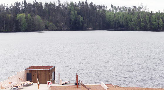 Fotografi över Sjölanda badplats