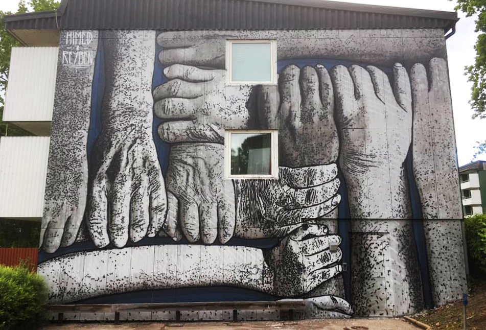 mural painting with hands