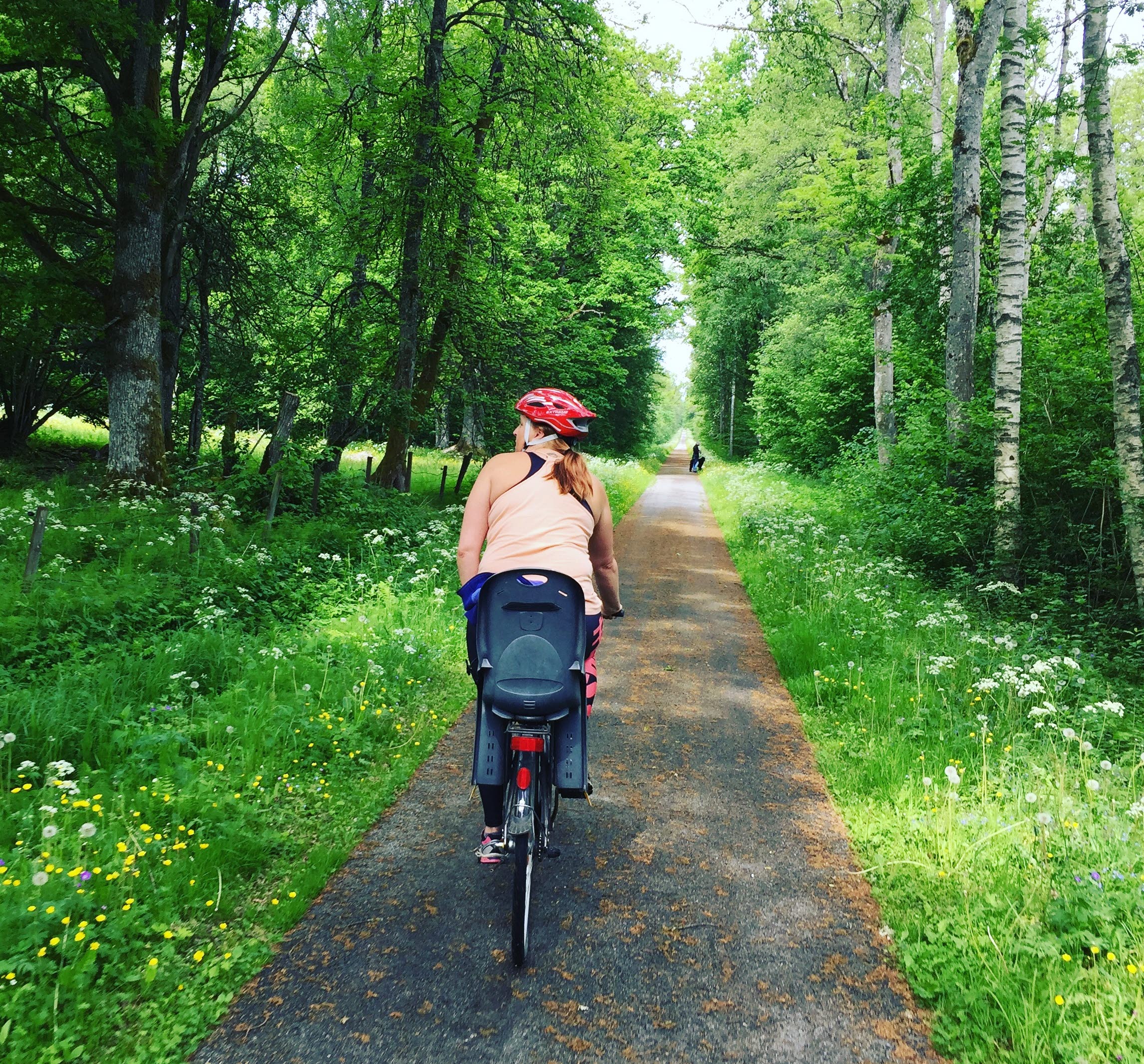 A cyklist on a small road