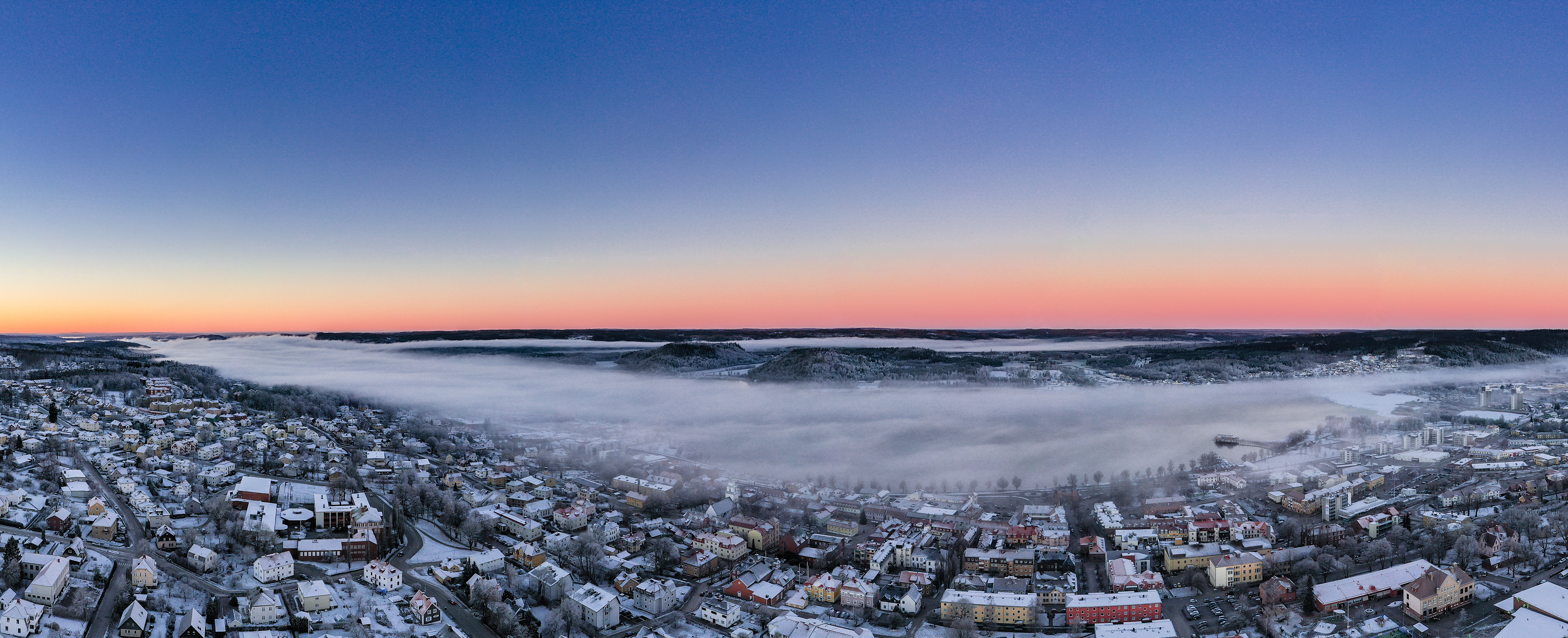 Winter view of Ulricehamn when the sun is going up.