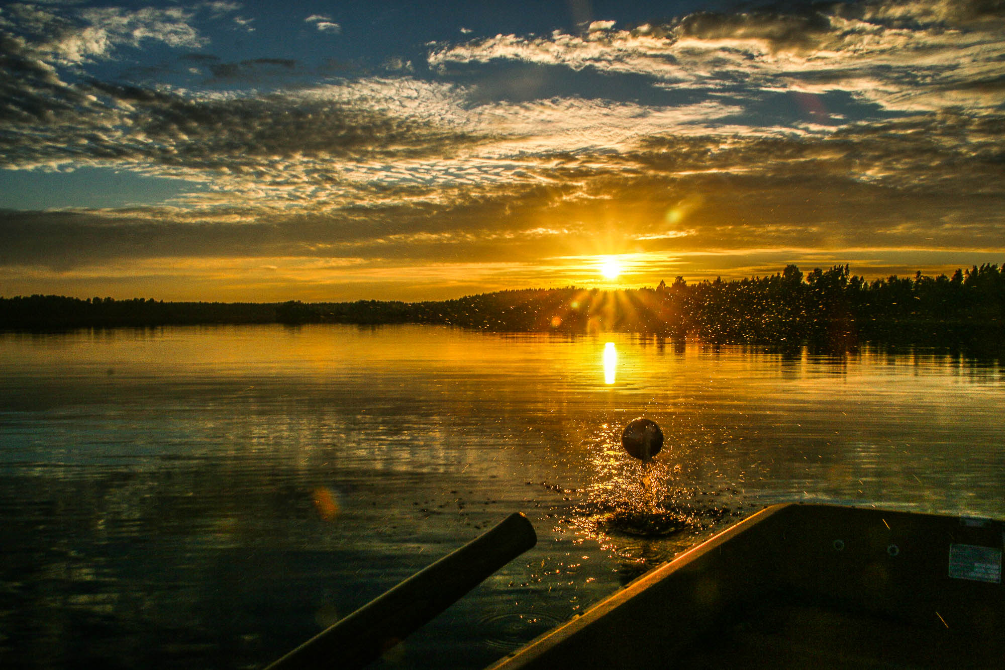 Solnedgång över Kvinnestadssjön